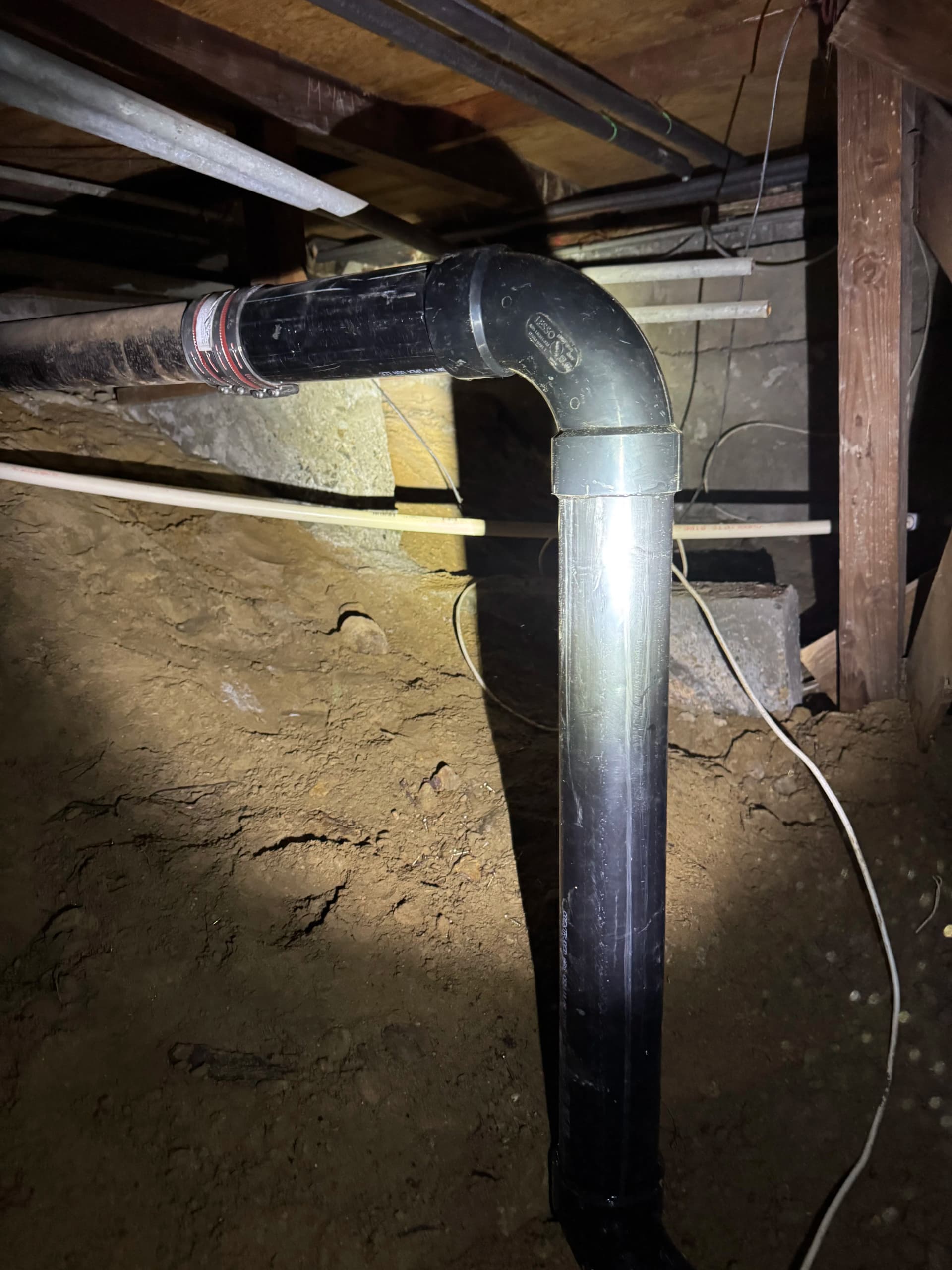 Rotted Cast Iron Sewer Line Replaced with ABS Pipe image