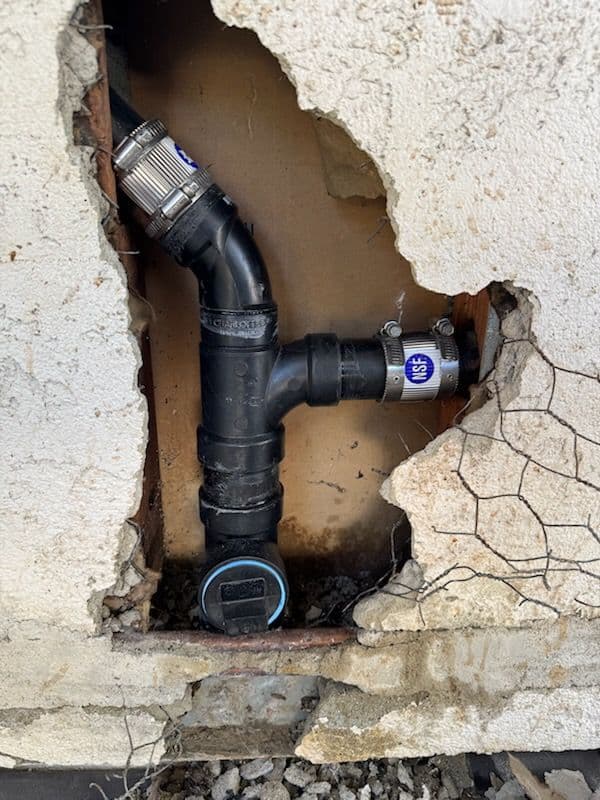 Efficient Kitchen Drain Wall Repair Solution image