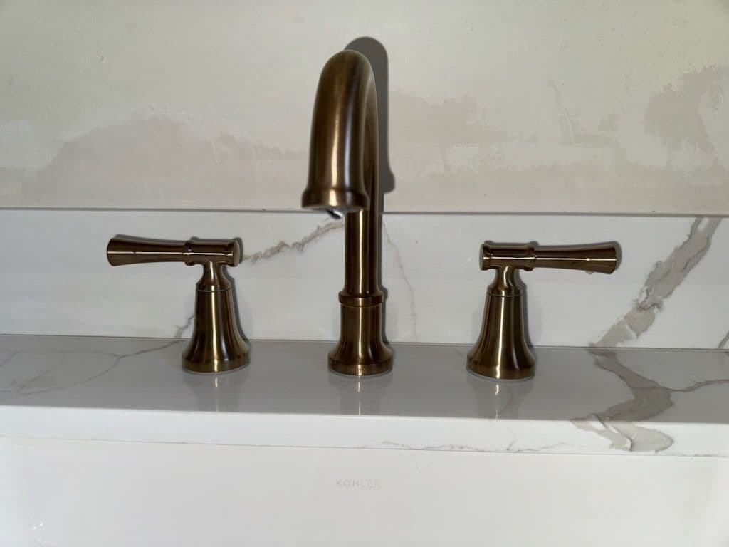 Bathroom Elegance with Brushed Bronze Faucets image