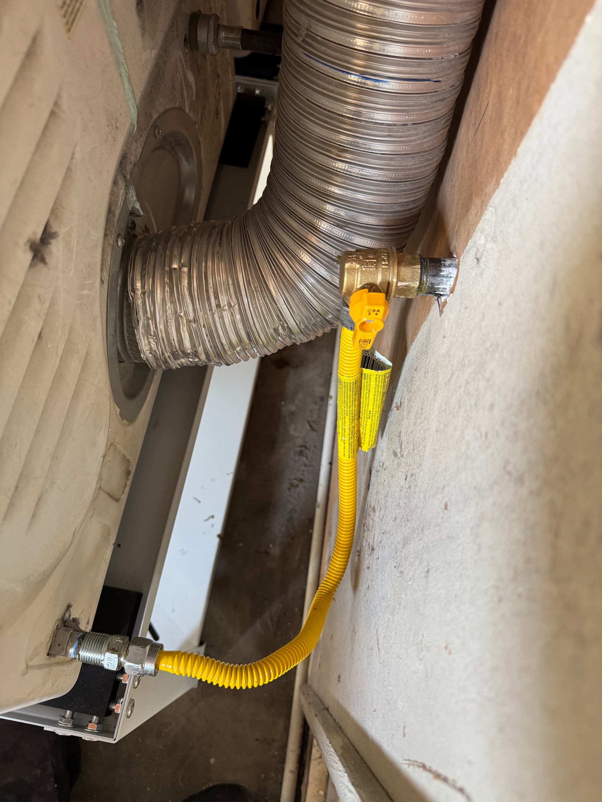 Gallery photos for Dryer Vent Rerouted to Exterior for Better Airflow: Image #2
