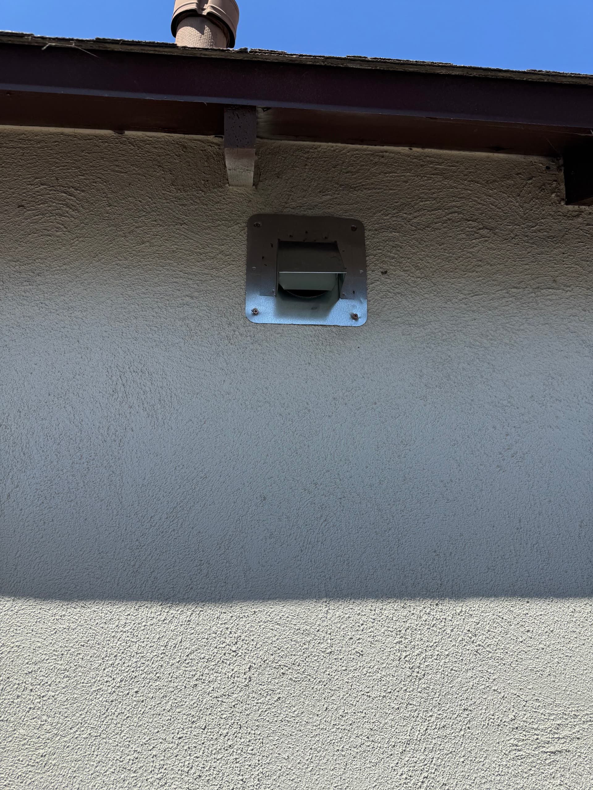 Gallery photos for Dryer Vent Rerouted to Exterior for Better Airflow: Image #3